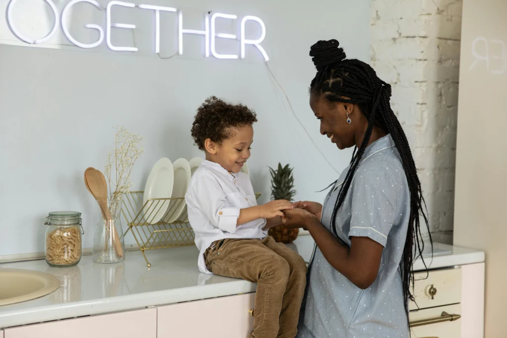 single mom with her son in kitchen