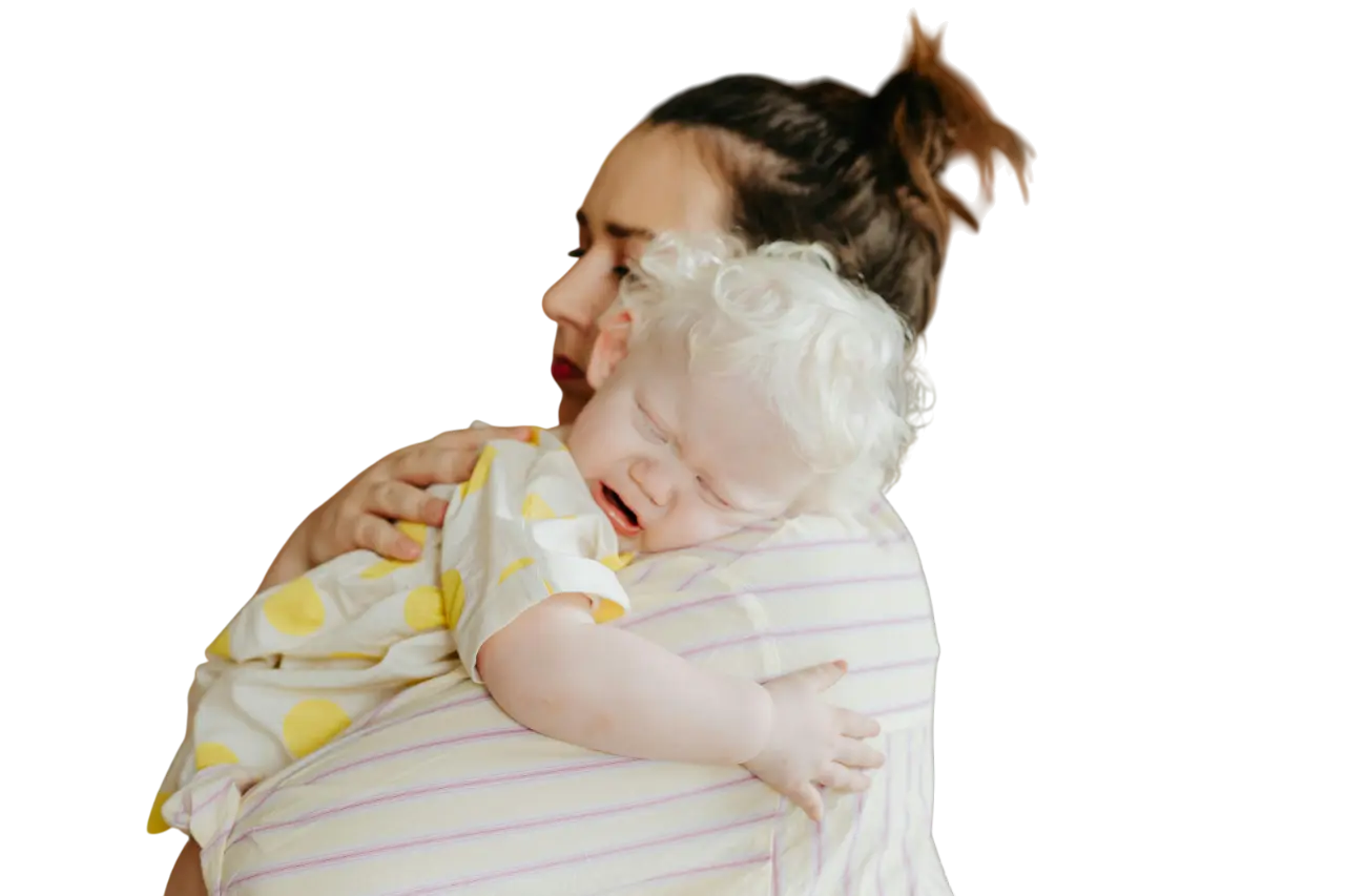 single mother carrying her baby