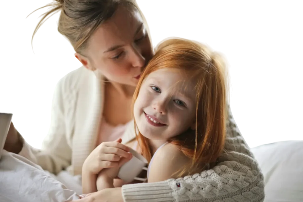 single mom kissing her child
